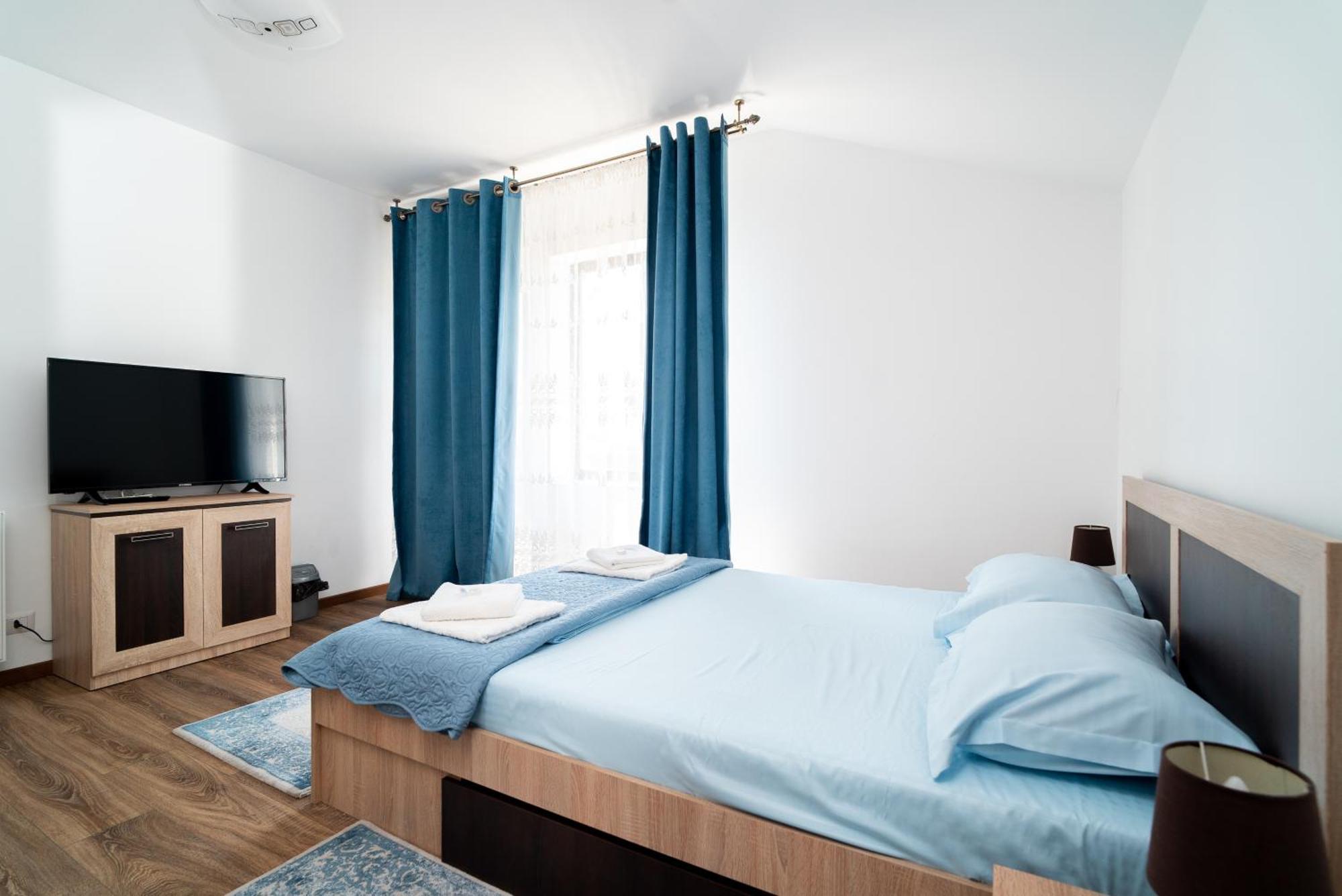 Gazde/Camere de închiriat Casa Amina